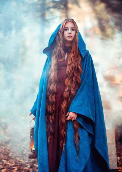 girl wearing a cloak

